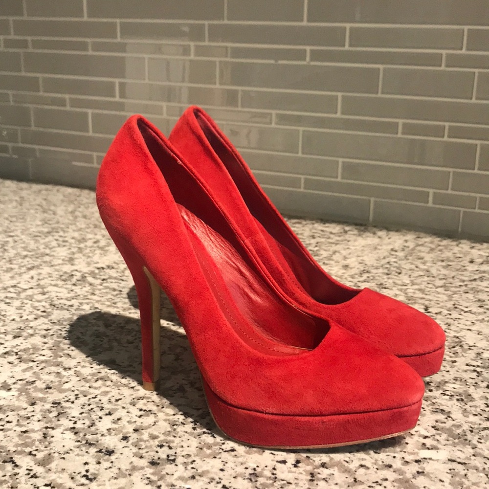 Also Red suede platform pointy high heels